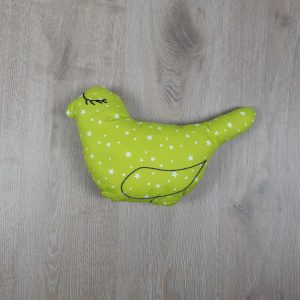 Coussin forme oiseau vert et étoiles